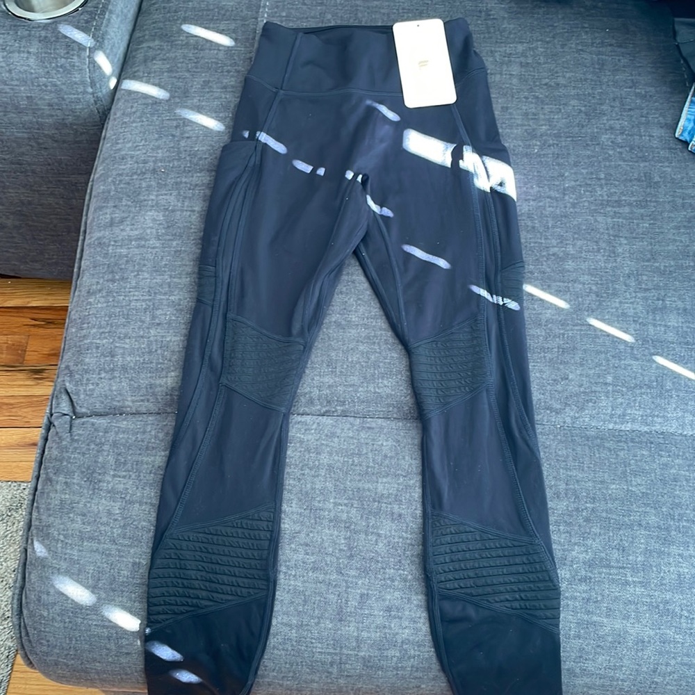 Fabletics, new with tags high waisted 7/8” yoga pants with mesh panel design